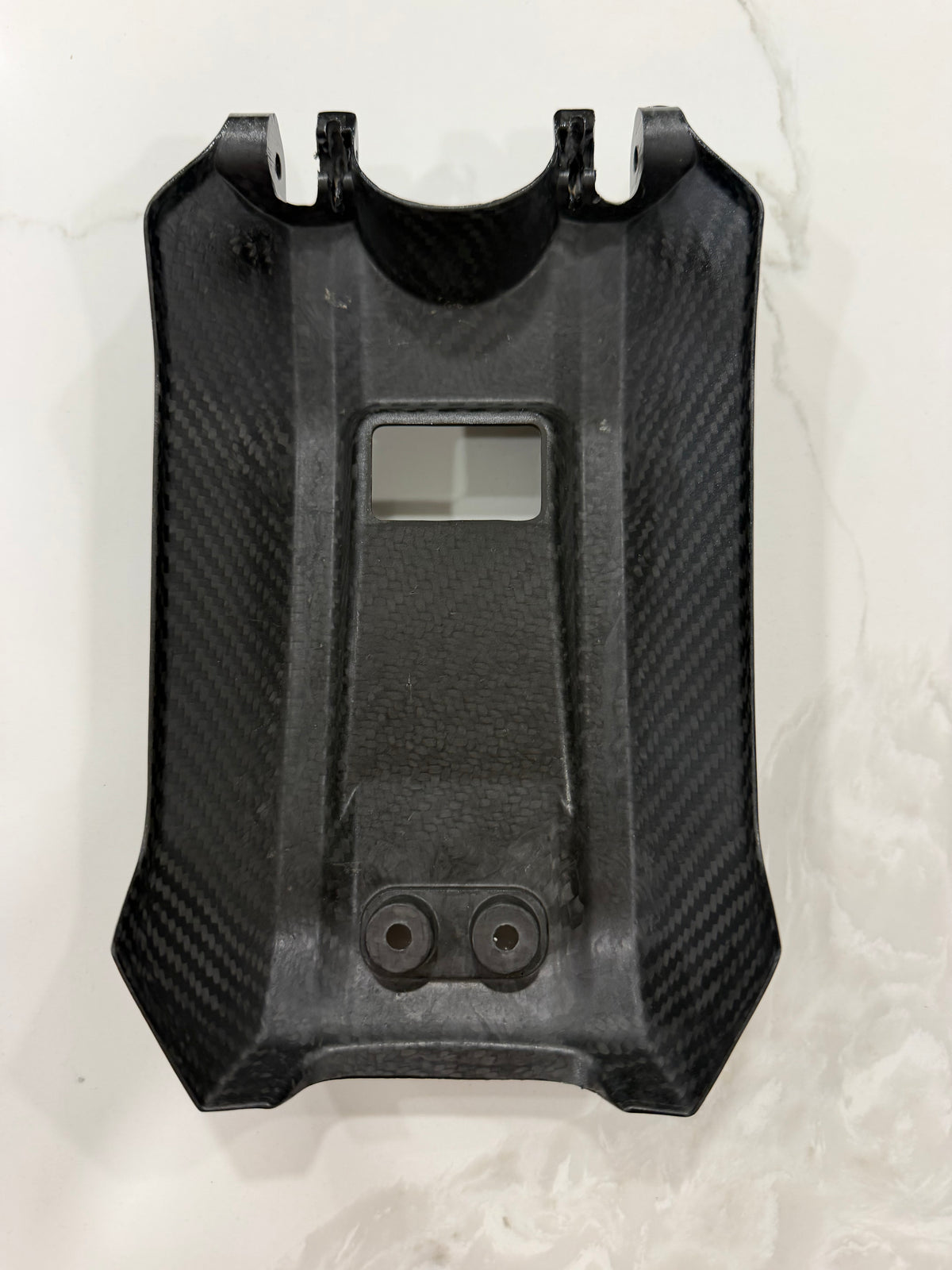 Sur-Ron LBX battery cover in real carbon fiber – top view – Ghost Carbon